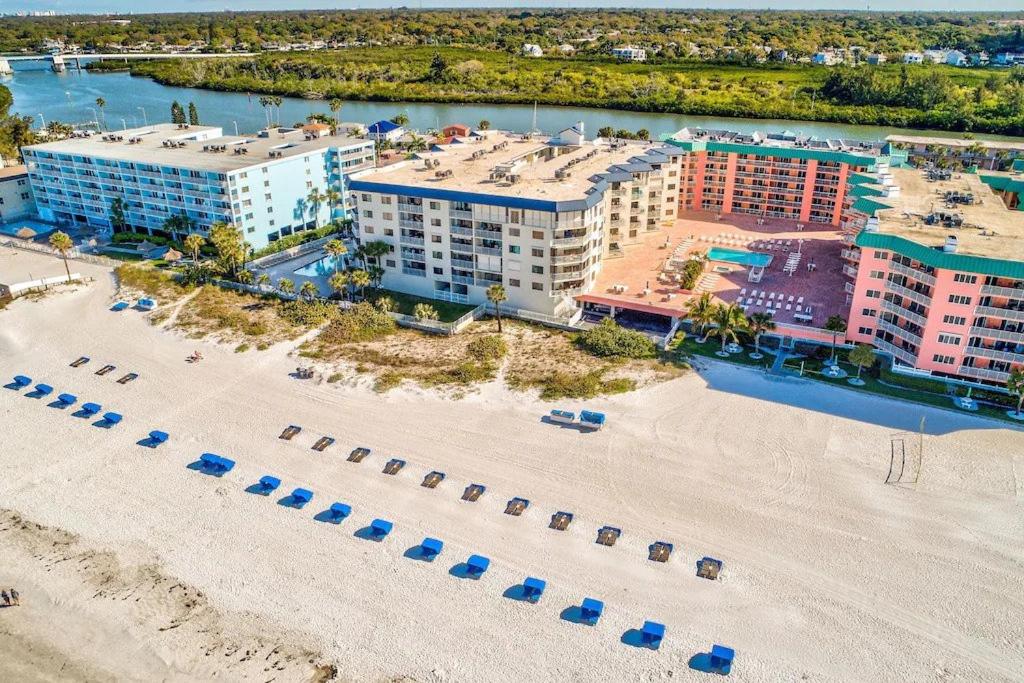 an aerial view of a beach and buildings at Beach Palms- Unit 102 in Clearwater Beach