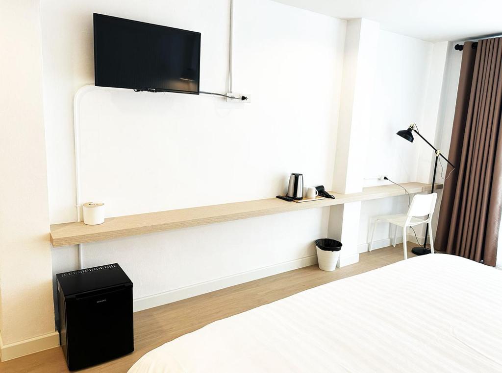 TV a/nebo společenská místnost v ubytování River Home Bangkok