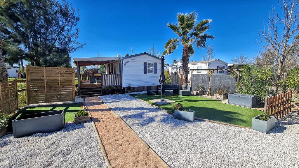 Zahrada ubytování Mobil home 6 personnes camping 4* Les Pins Maritimes