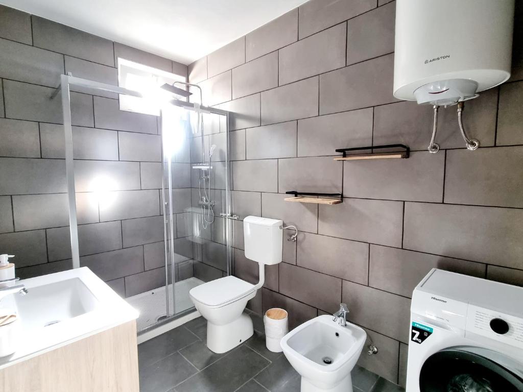 Koupelna v ubytování Apartments Žman
