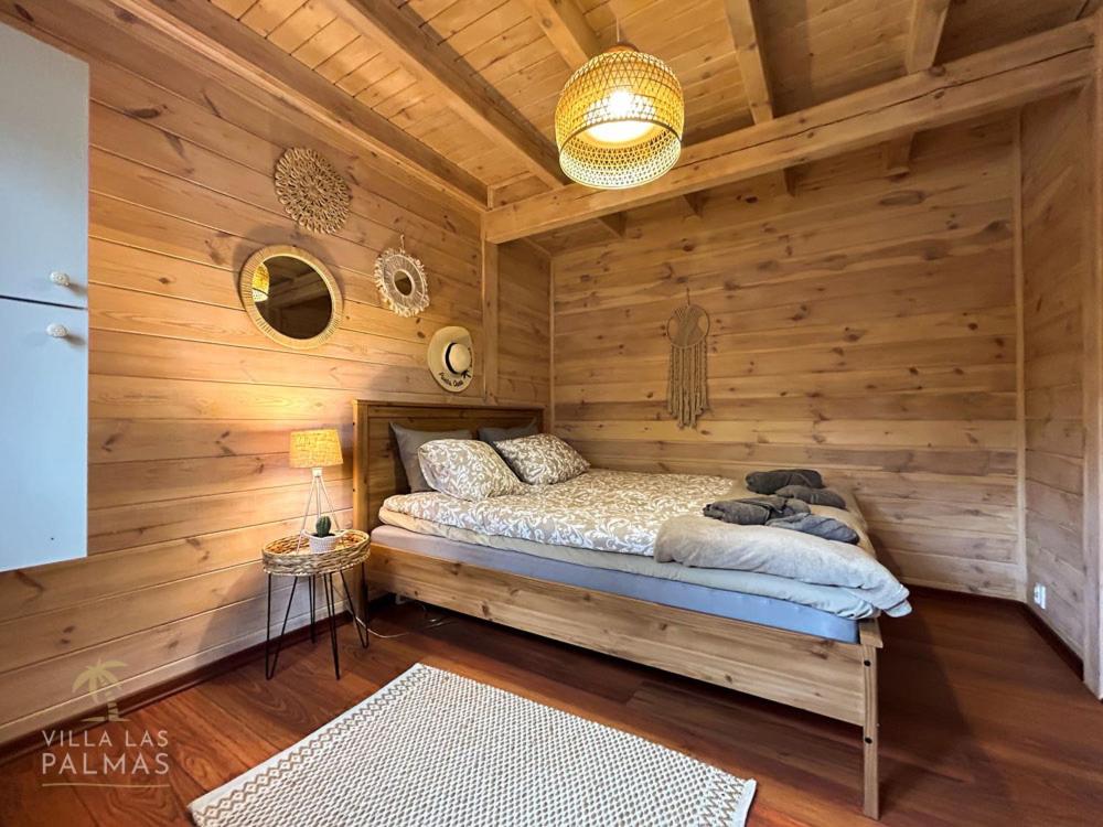 Postel nebo postele na pokoji v ubytování Villa Las Palmas