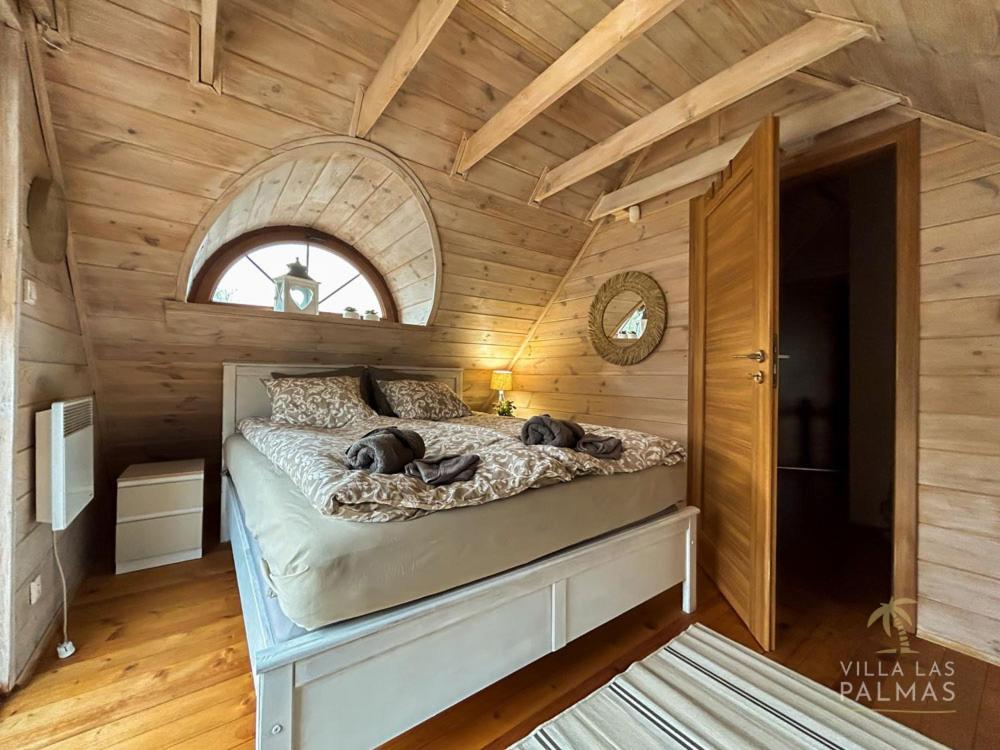Postel nebo postele na pokoji v ubytování Villa Las Palmas