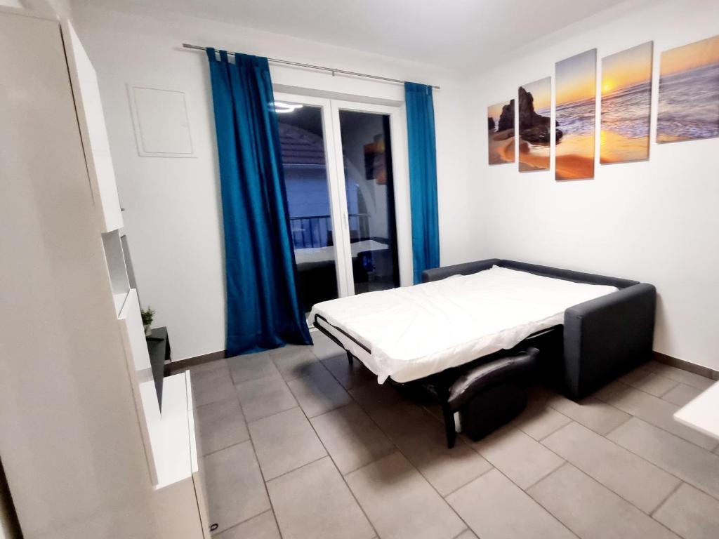 Postel nebo postele na pokoji v ubytování Apartments Žman