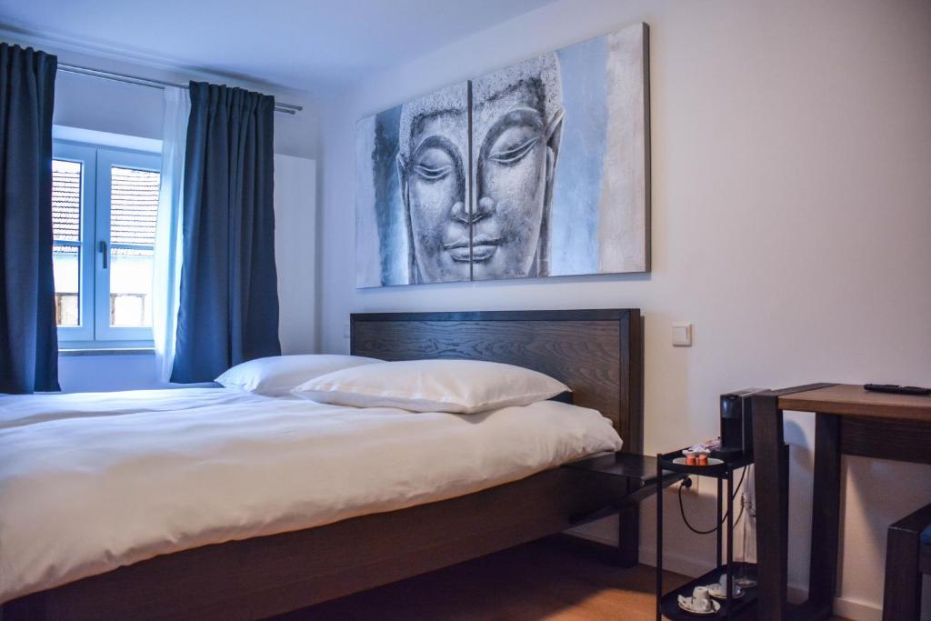 Postel nebo postele na pokoji v ubytování Hotel Pame Grill