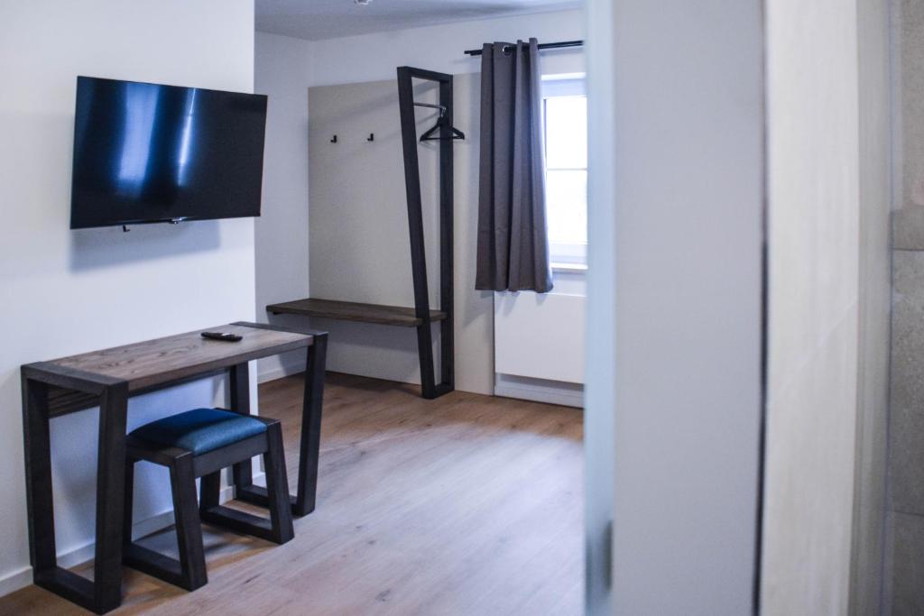 TV a/nebo společenská místnost v ubytování Hotel Pame Grill