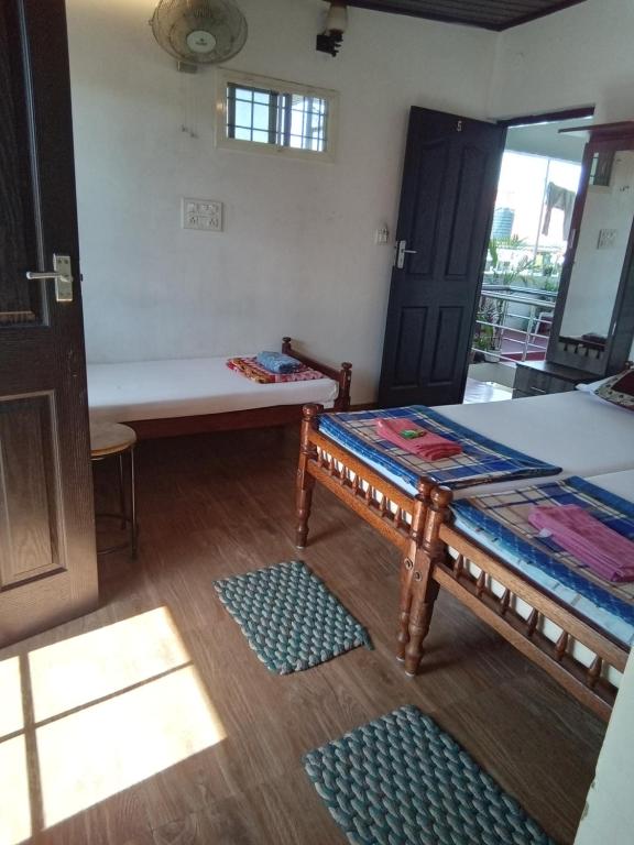Postel nebo postele na pokoji v ubytování ChristVille
