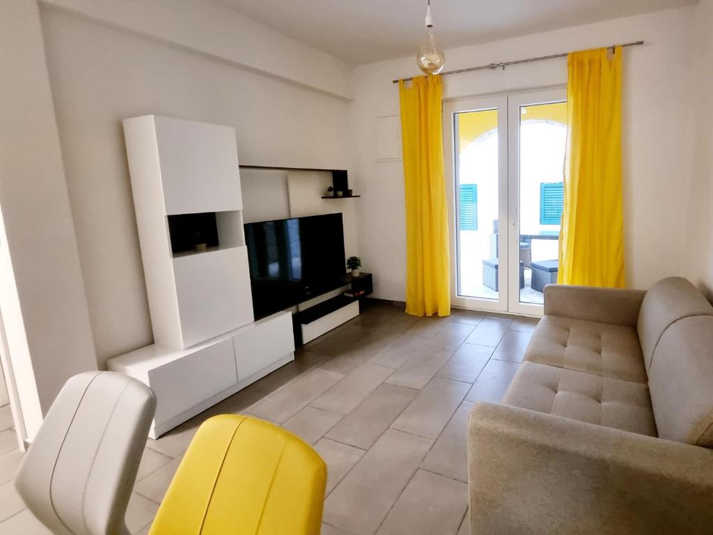 TV a/nebo společenská místnost v ubytování Apartments Žman