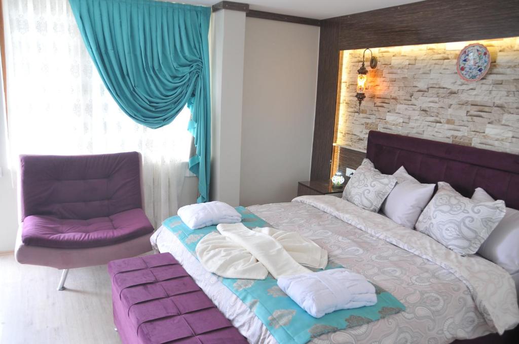 Postel nebo postele na pokoji v ubytování Hotel Goreme Sakura