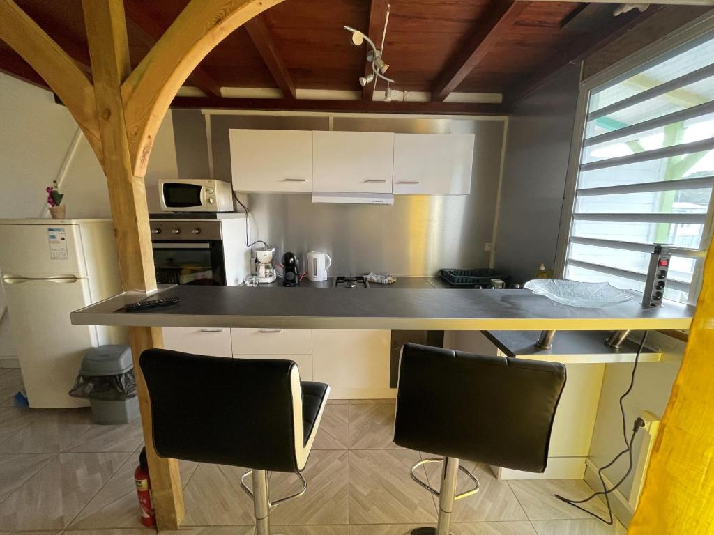 Kuchyň nebo kuchyňský kout v ubytování Residence Chez Marraine Maison BERTILI