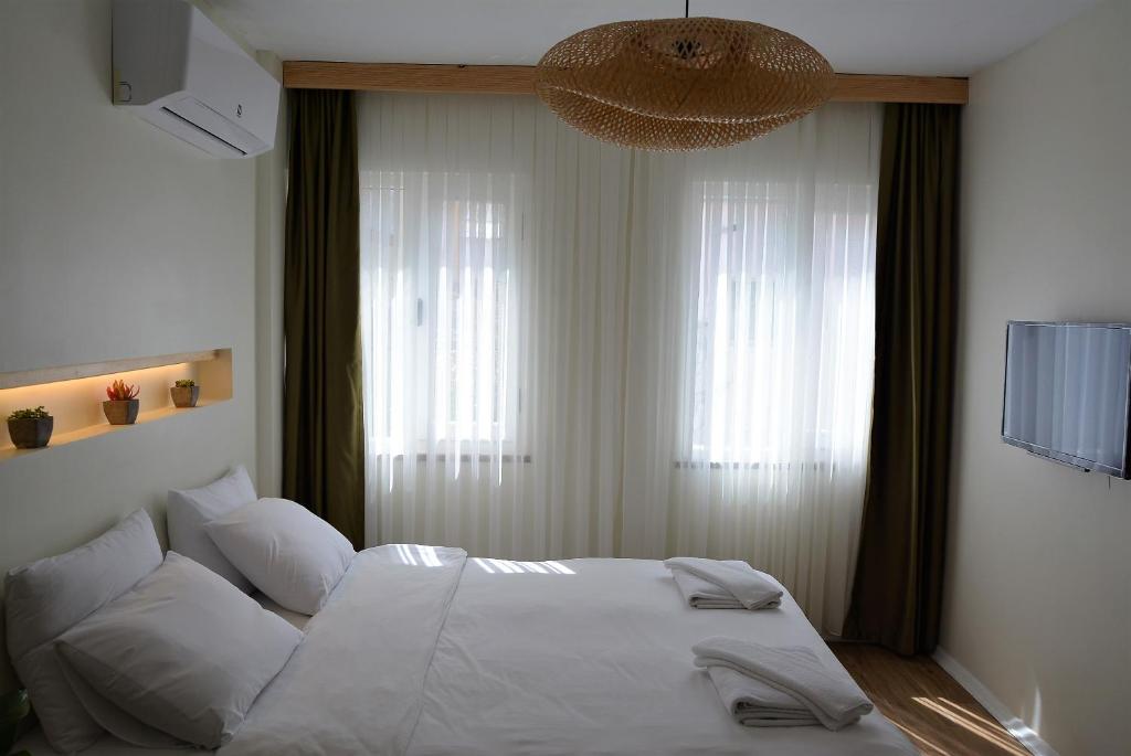 Letto o letti in una camera di Gaja Ayvalık