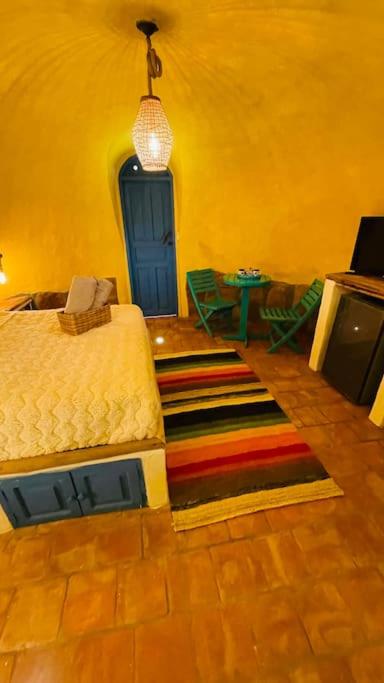 Postel nebo postele na pokoji v ubytování Hermoso Glamping Santorini