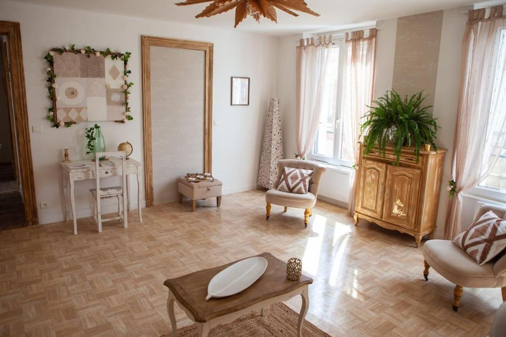Część wypoczynkowa w obiekcie Appartement Un moment d’ÉVAsion