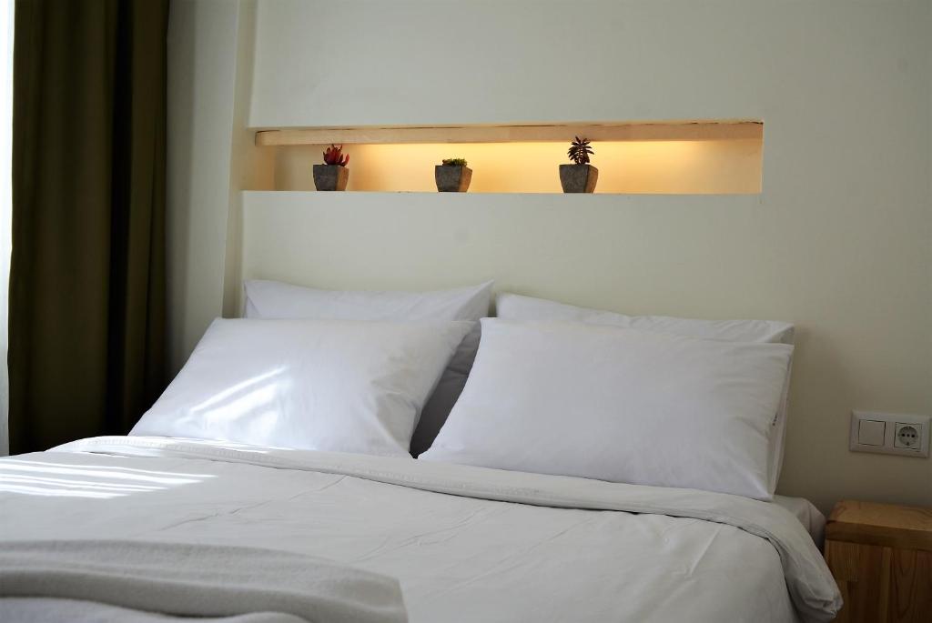 Letto o letti in una camera di Gaja Ayvalık