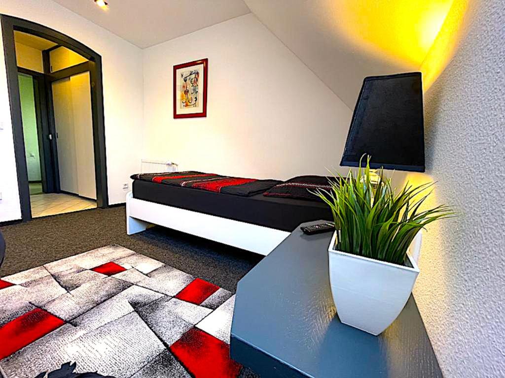 Postel nebo postele na pokoji v ubytování Hotel Uthoff