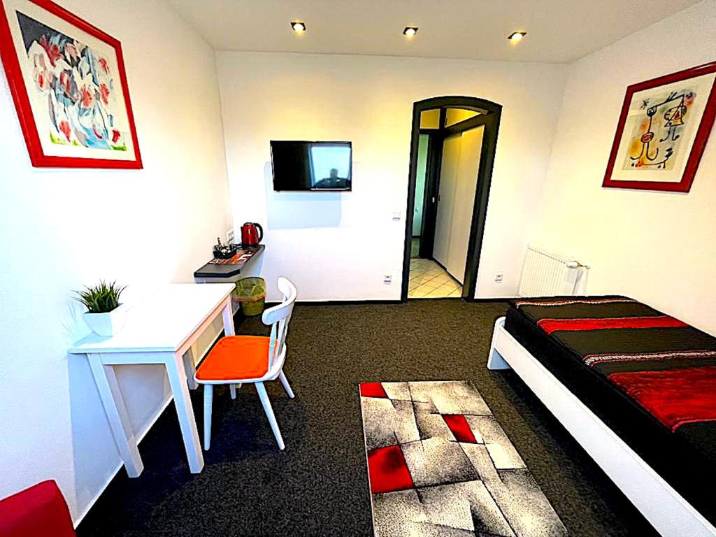 Postel nebo postele na pokoji v ubytování Hotel Uthoff