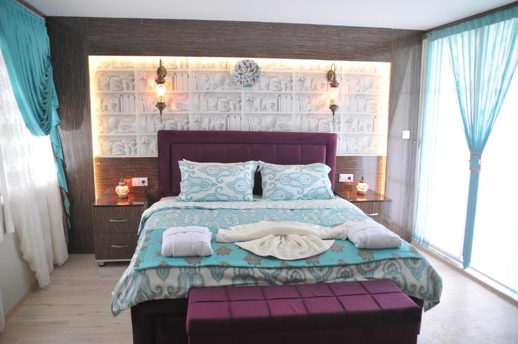 Postel nebo postele na pokoji v ubytování Hotel Goreme Sakura