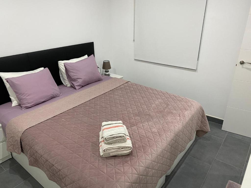 Postel nebo postele na pokoji v ubytování Cozy apartment, very fresh at Playa de Gandia