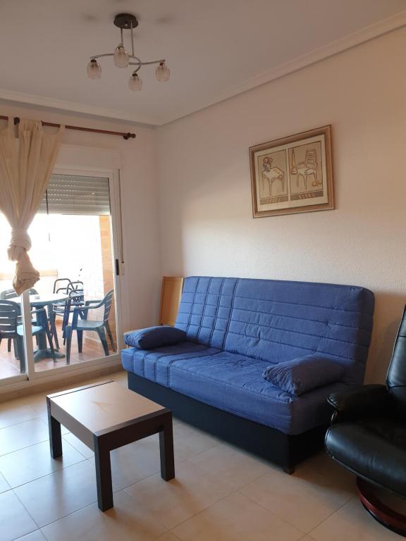 Posezení v ubytování Apartamento acogedor en Magic World, Torre la Sal