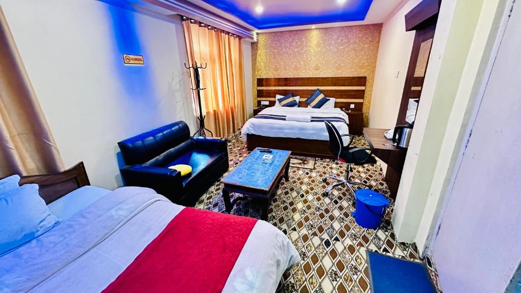 Krevet ili kreveti u jedinici u objektu Hotel Pathibhara