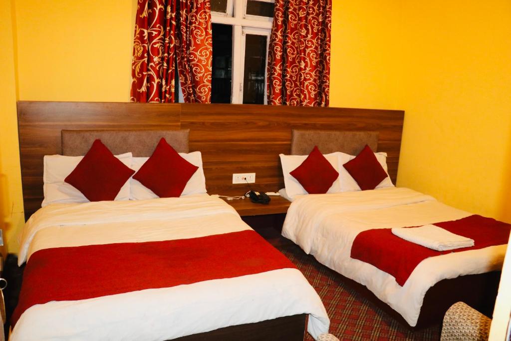 Krevet ili kreveti u jedinici u objektu Hotel Pathibhara