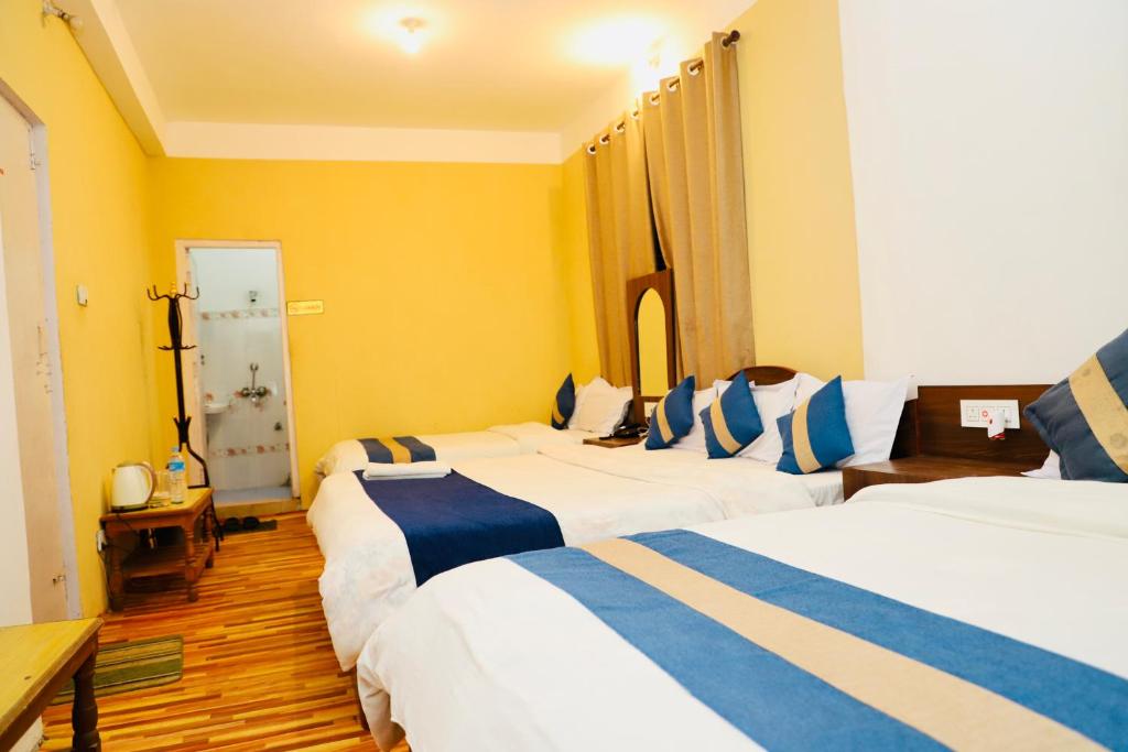 Krevet ili kreveti u jedinici u objektu Hotel Pathibhara