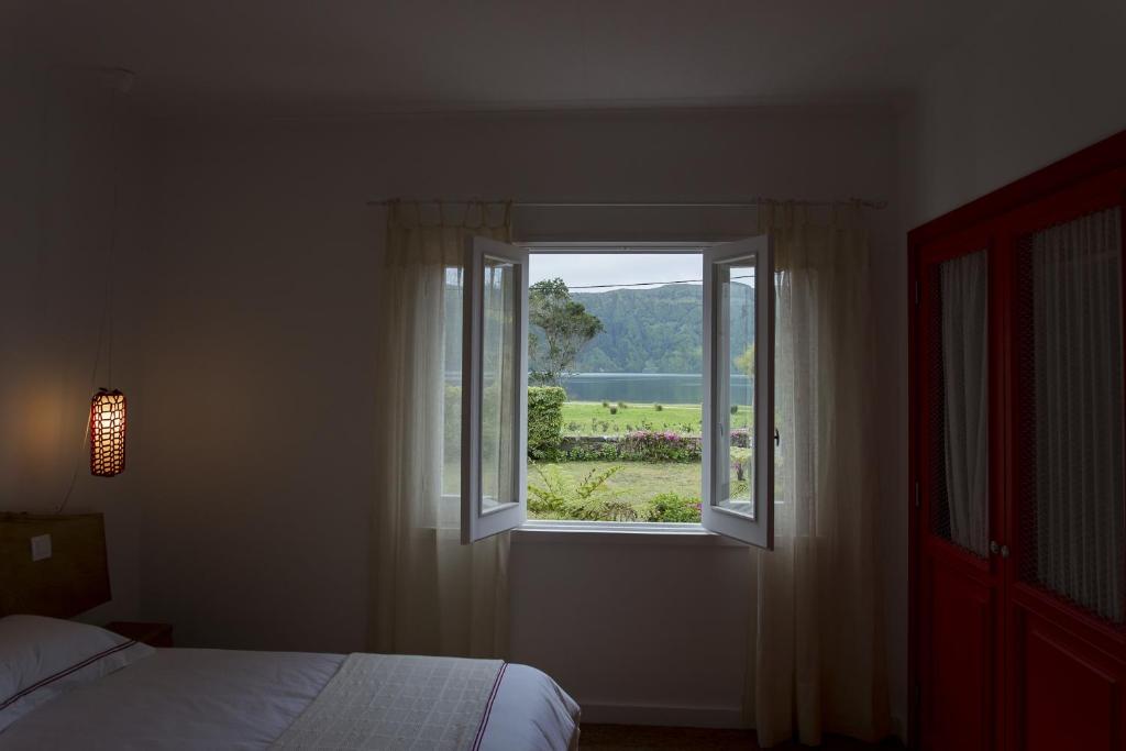 Postel nebo postele na pokoji v ubytování Lake View House
