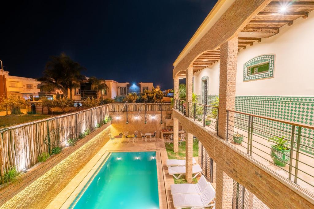 The swimming pool at or close to Riad Les Nuits De Fès