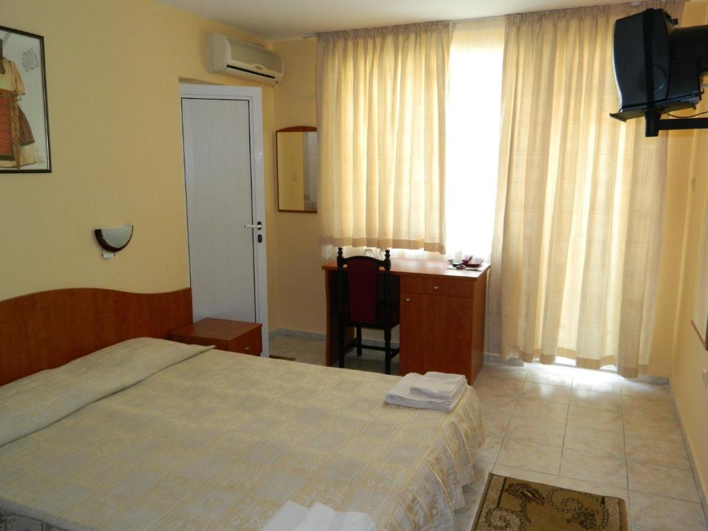 Postel nebo postele na pokoji v ubytování Family Hotel Andreev