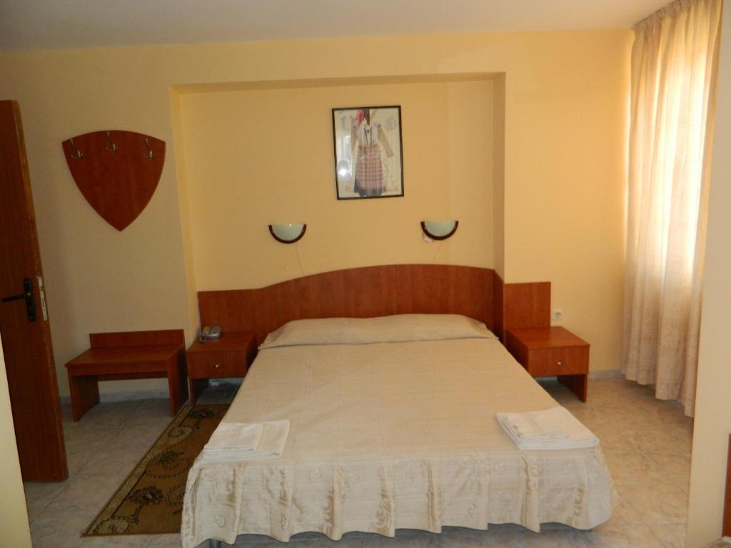 Postel nebo postele na pokoji v ubytování Family Hotel Andreev