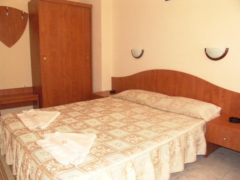 Postel nebo postele na pokoji v ubytování Family Hotel Andreev
