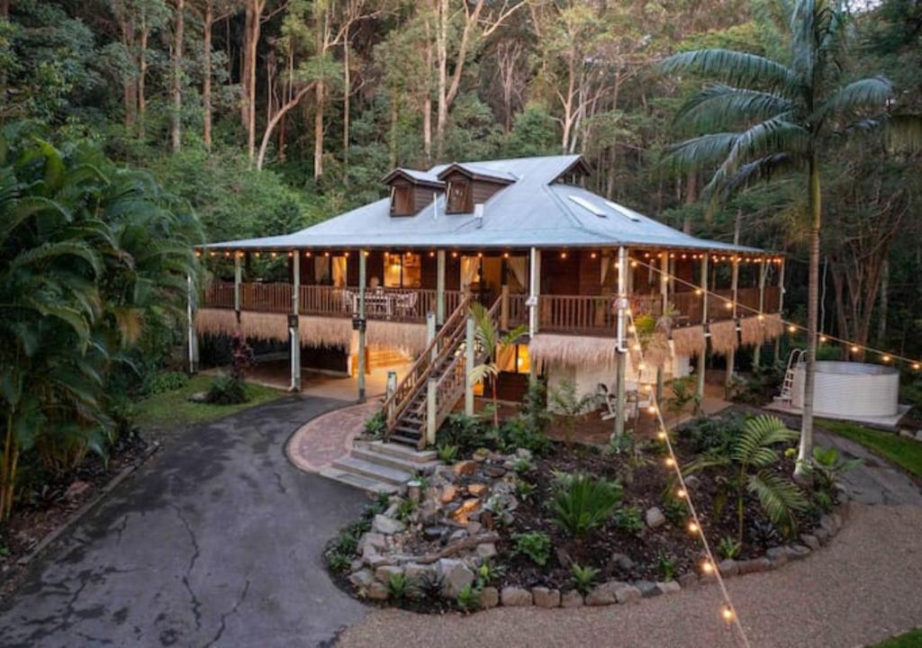 a house in the middle of a forest at The Forest Buré - Fijian Hinterland Retreat in Ninderry