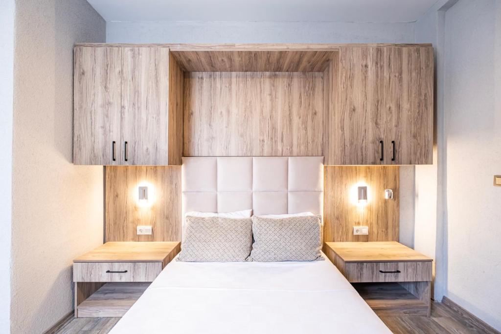 A bed or beds in a room at Hotel Centro Bodrum
