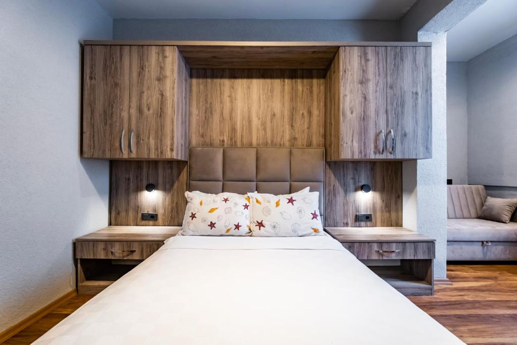 A bed or beds in a room at Hotel Centro Bodrum