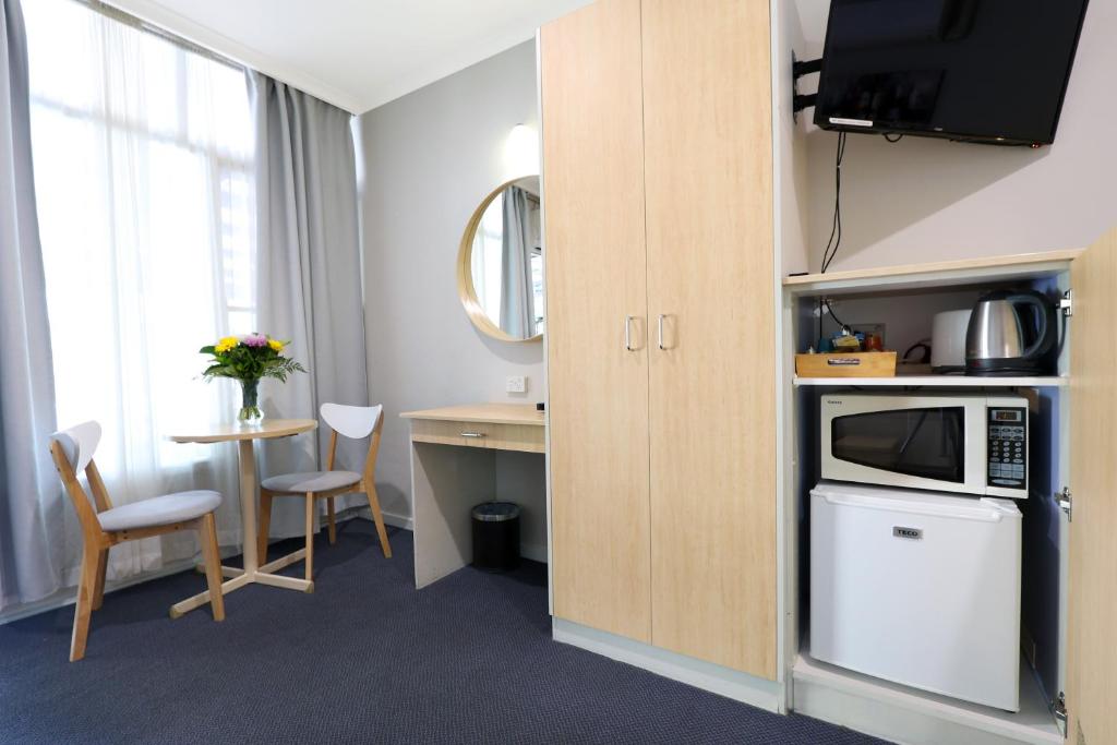 Kuchyň nebo kuchyňský kout v ubytování Nebula Motel