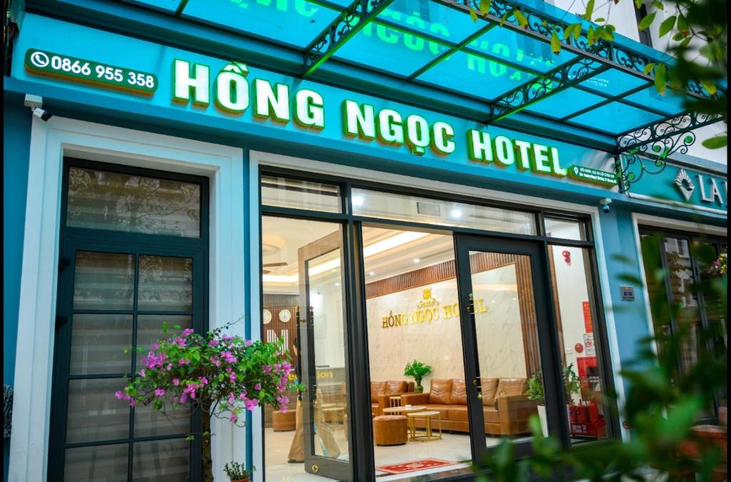 a hong noco hotel sign on the front of a building at Hồng Ngọc Hạ Long Hotel in Ha Long