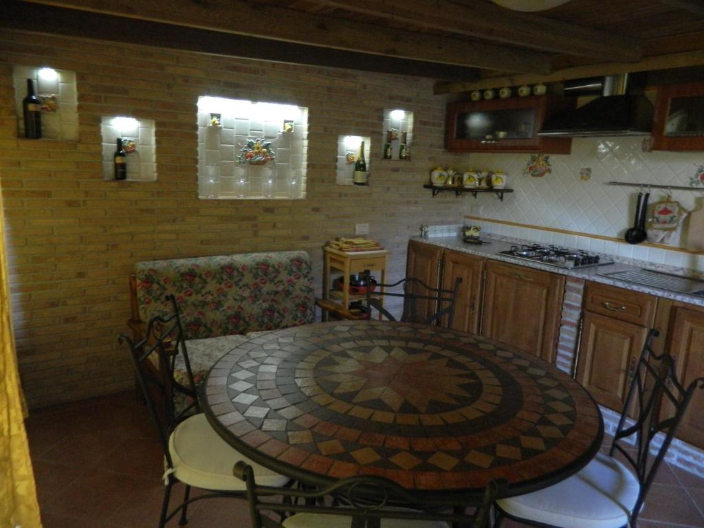 Kuchyň nebo kuchyňský kout v ubytování Country Apartments