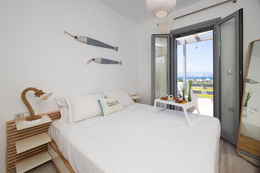 Posteľ alebo postele v izbe v ubytovaní The Nine Graces - Agia Anna - Option With private pool or hot tub