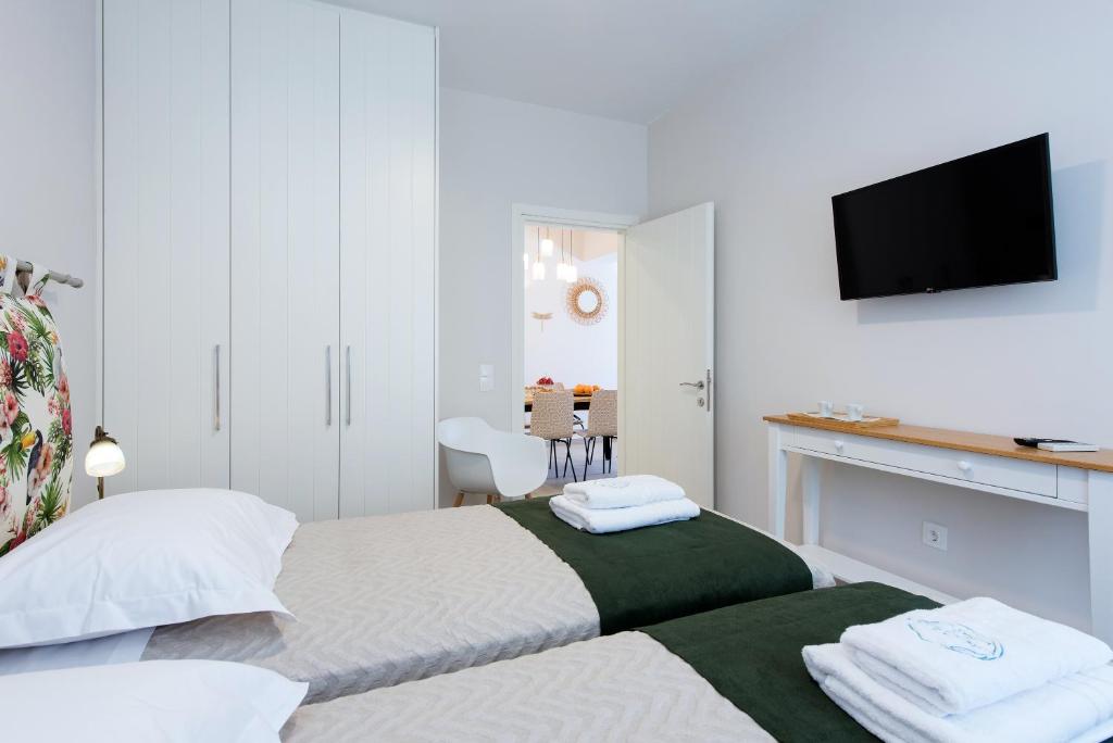 Postel nebo postele na pokoji v ubytování Lucky Villas