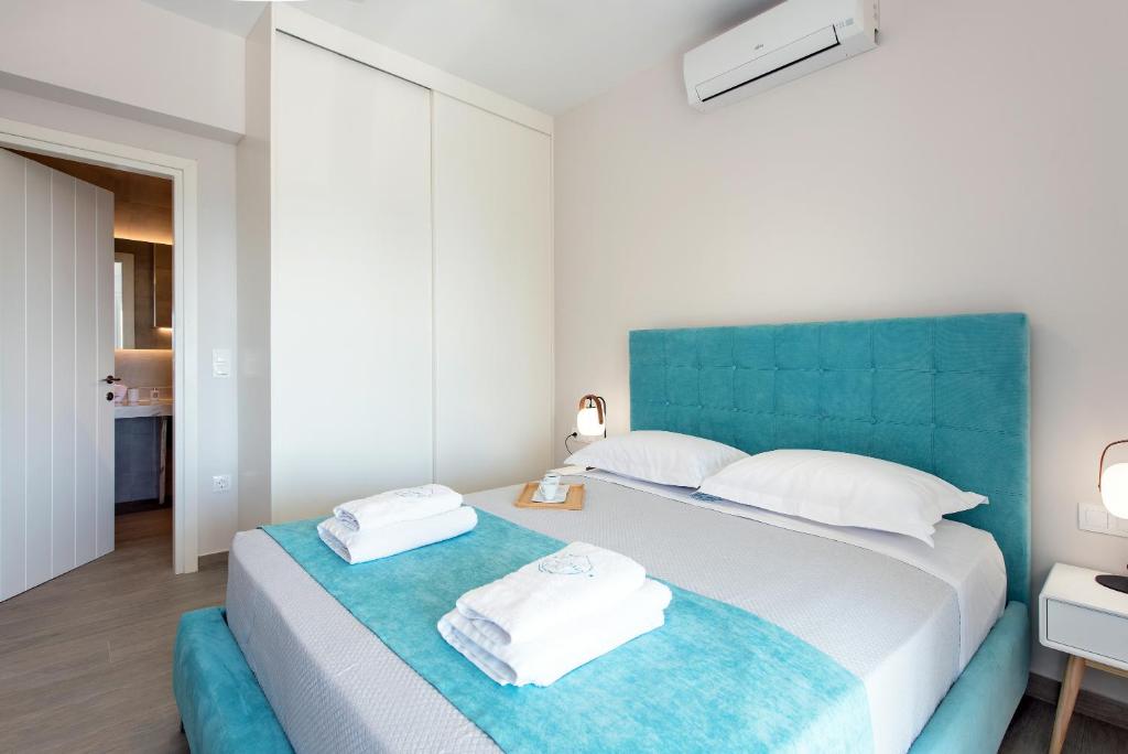 Postel nebo postele na pokoji v ubytování Lucky Villas
