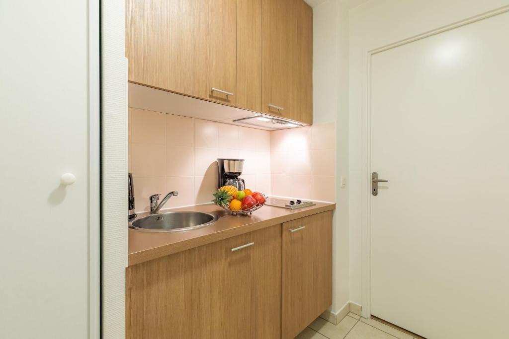Una cocina o cocineta en Appart'City Confort Toulouse Purpan