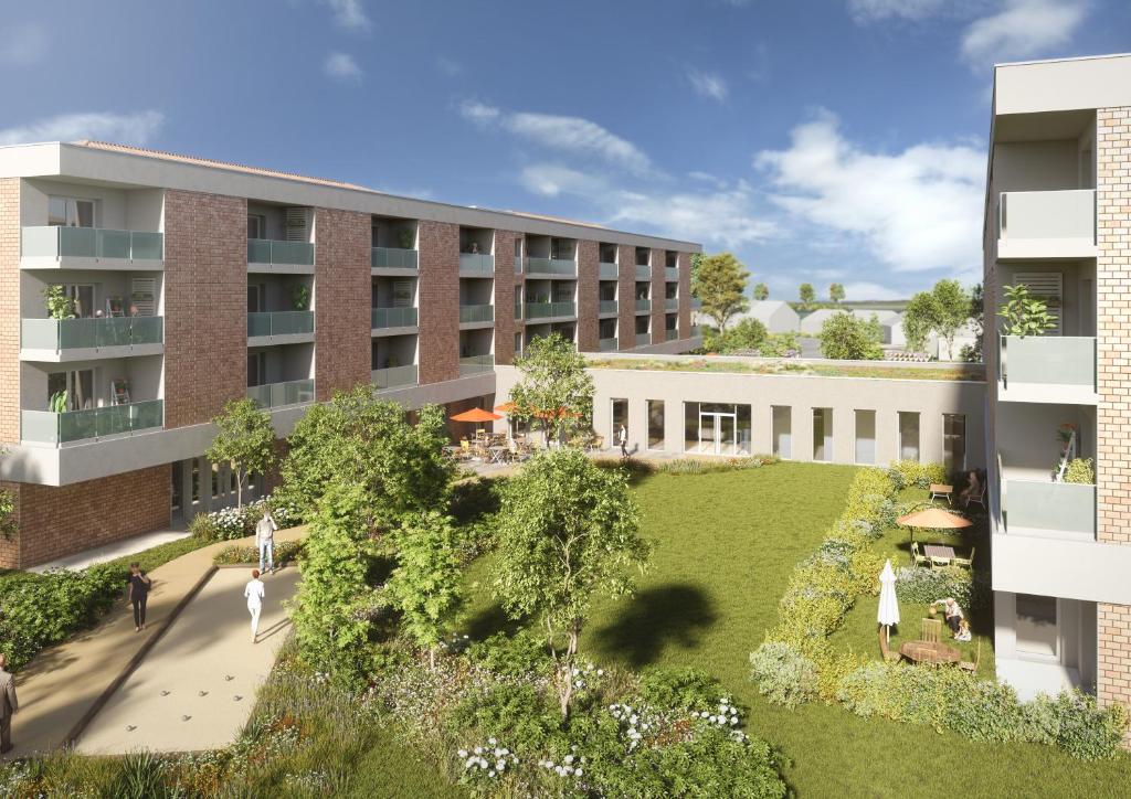 una vista aerea di un edificio con cortile di Domitys Les Cépages a Gaillac