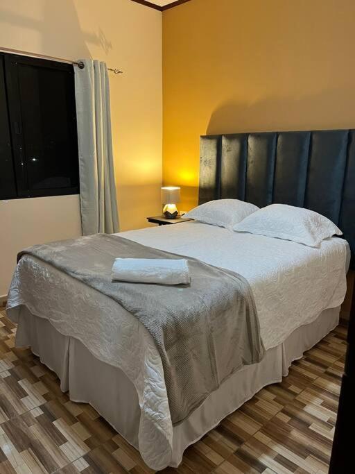 Postel nebo postele na pokoji v ubytování Casa Hacienda Real