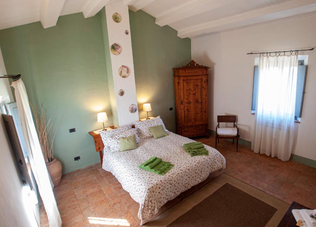 Postel nebo postele na pokoji v ubytování Villa San Regolino whit private pool