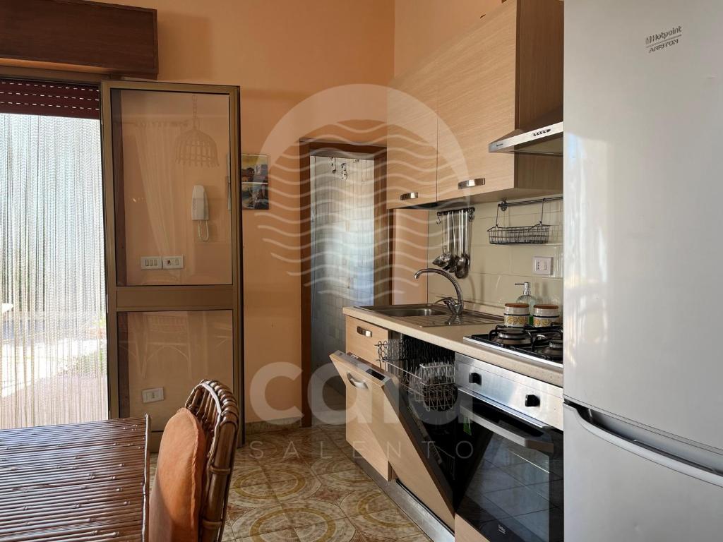Kuchnia lub aneks kuchenny w obiekcie Villa Corallo By Cala Salento