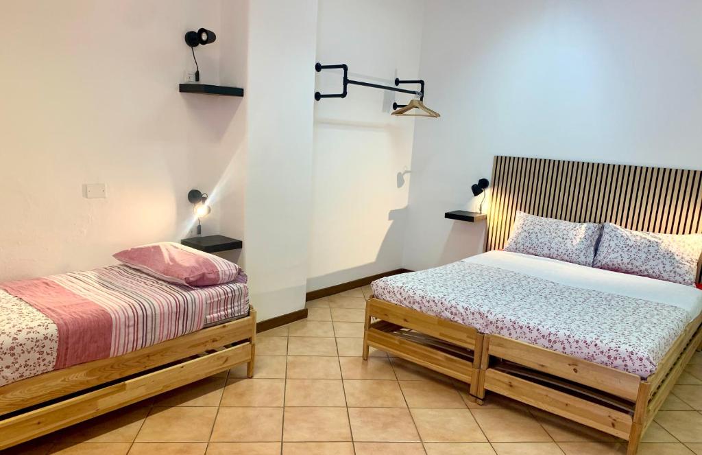 Postel nebo postele na pokoji v ubytování Cascina Bellaria