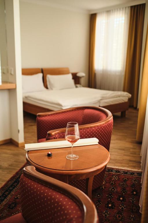 Postel nebo postele na pokoji v ubytování Hotel Exel