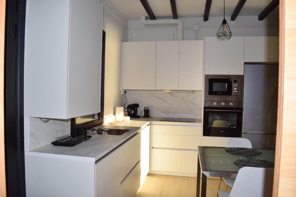 Kuchyň nebo kuchyňský kout v ubytování Casa Cuartel