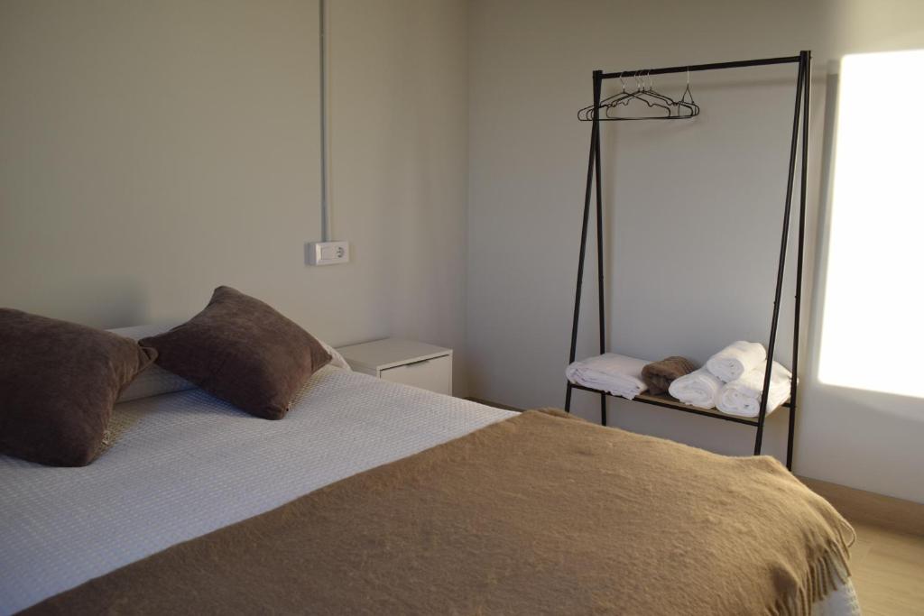 Postel nebo postele na pokoji v ubytování Casa Cuartel