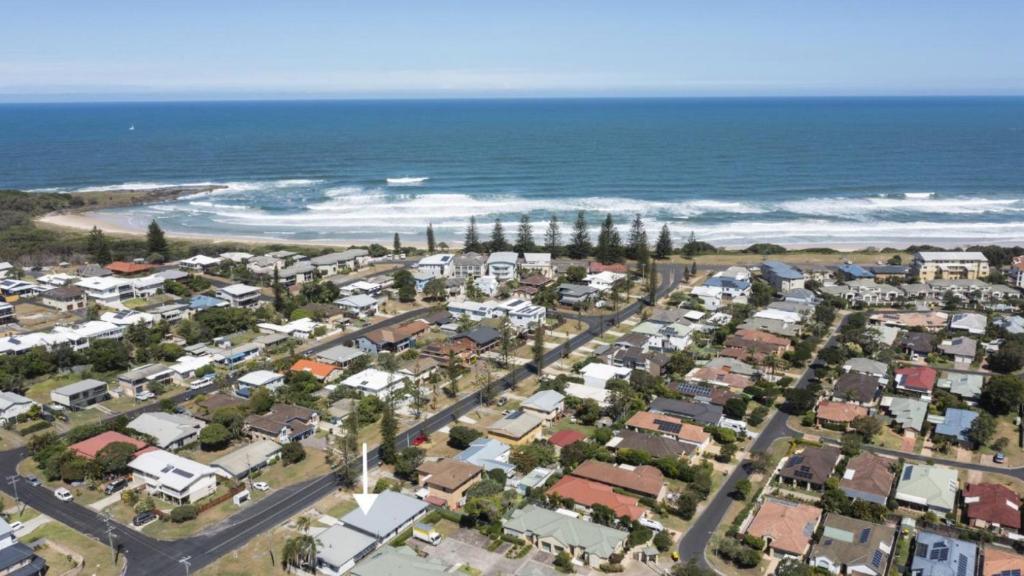 an aerial view of a suburb next to the ocean at Sunnyvale 2 - Pet Friendly in Yamba