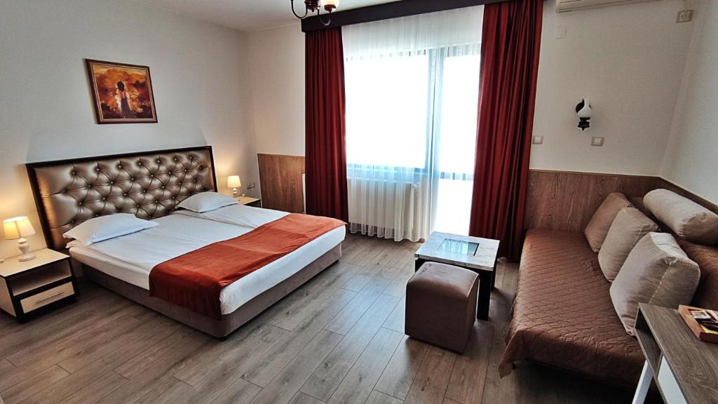 Postel nebo postele na pokoji v ubytování Makaza Complex